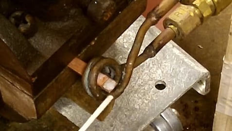 Brazing a copper bus to a silver coated contact