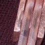 Braze four copper bus bars together