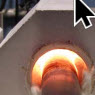 image: Preheating steel rods for forging in a fastener manufacturing process