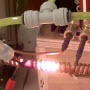 Preheating a titanium alloy wire prior to welding