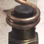 image: Heating a copper end cap to melt wax