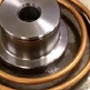 image: Pre-heating a steel plate and a carriage roller shaft 