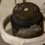 Induction heating a steel grenade for a disposing application