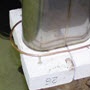 image: Soldering a steel canister for sealing