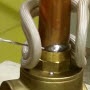 image: Soldering a copper tube to a brass flow valve