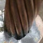 image: Soldering electrical wire to a copper grounding