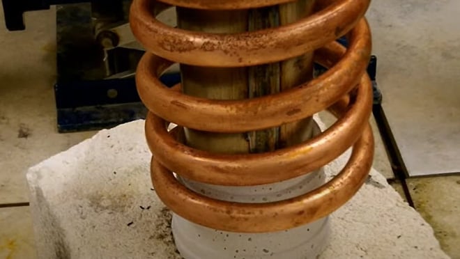 Heating a welded steel tube with induction