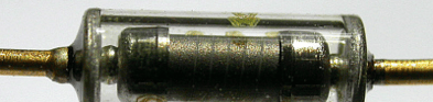 Hermetically sealing glass-enclosed resistors