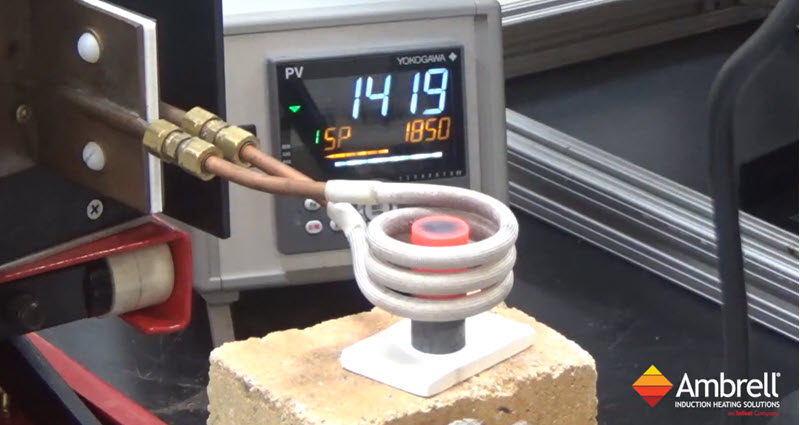 A video showing induction fastener preheating for forging
