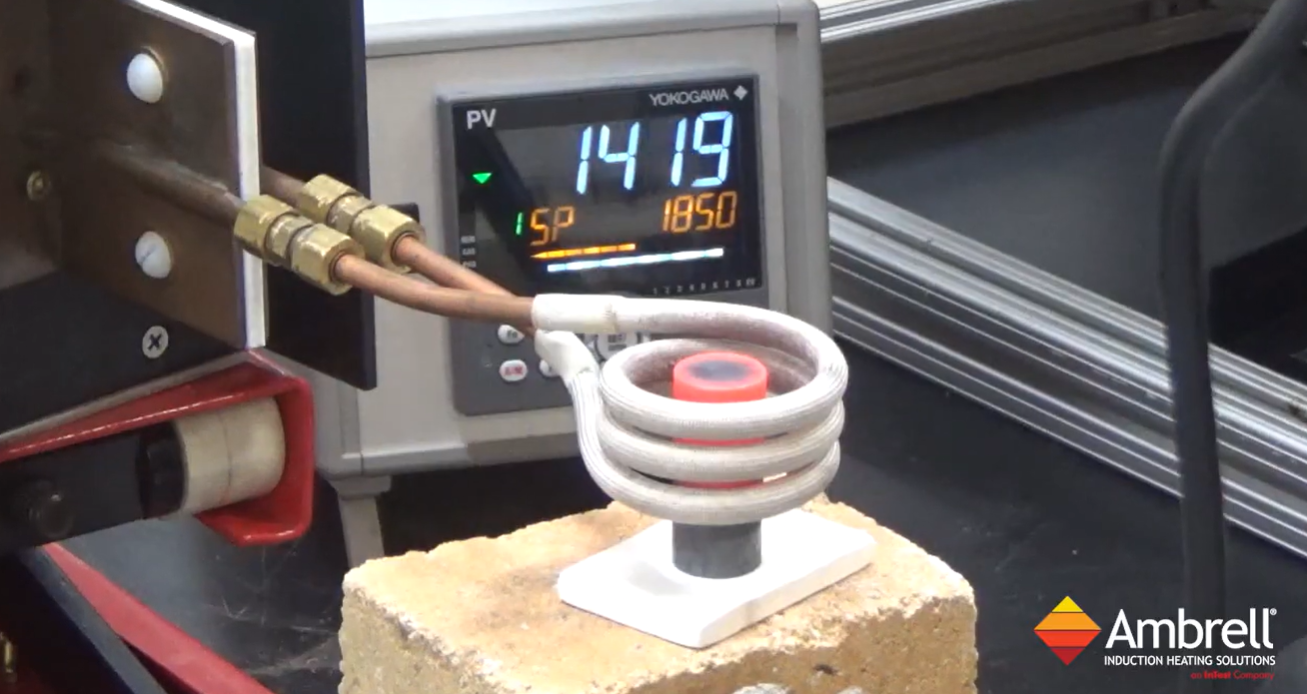 A video showing induction fastener preheating for forging