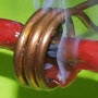Heat a braided cable prior to cutting