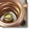 Heating brass inserts for metal-to-plastic insertion