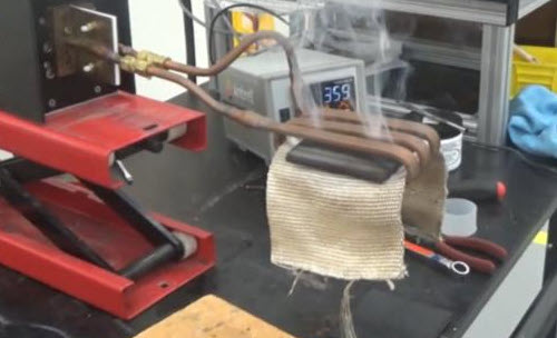 Removing Rubber Bonded to a Ferrous Substrate